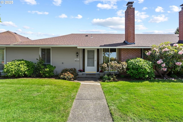 14190 SW 6th St, Beaverton, OR 97005 - view of front of property featuring a shingled roof, a chimney, and a front lawn