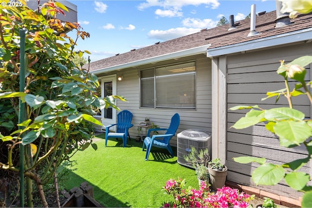 view of yard with central AC unit