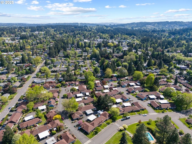 bird's eye view with a view of trees and a residential view
