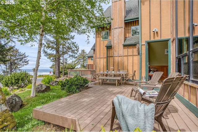 3360 NW Oceanview Dr, Newport, OR 97365 - deck with outdoor dining area and a water view