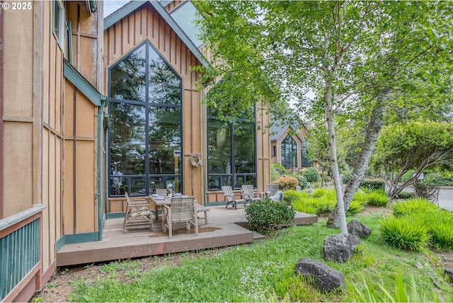 3360 NW Oceanview Dr, Newport, OR 97365 - exterior space with a deck and outdoor dining area