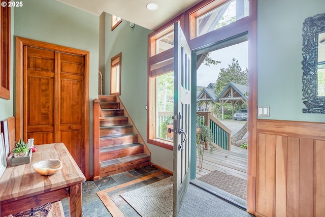 3360 NW Oceanview Dr, Newport, OR 97365 - doorway featuring stone tile floors and stairway