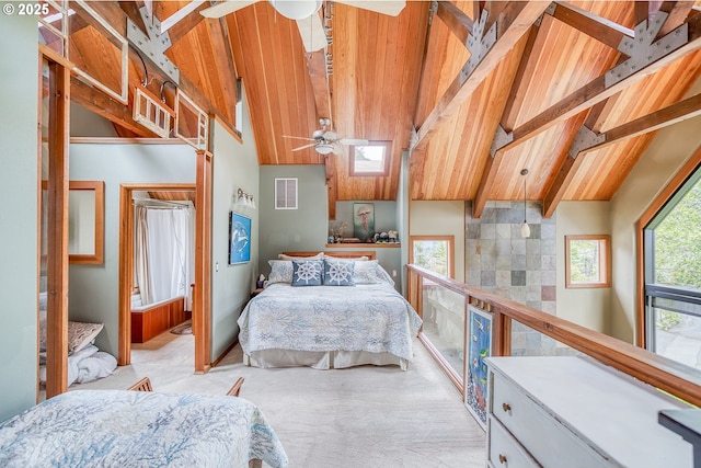 3360 NW Oceanview Dr, Newport, OR 97365 - carpeted bedroom featuring wood ceiling with exposed beams, a skylight, and high vaulted ceiling