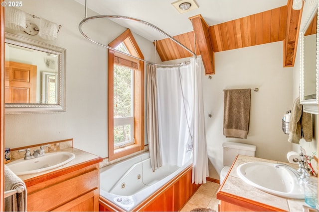 3360 NW Oceanview Dr, Newport, OR 97365 - bathroom featuring healthy amount of natural light, vanity, vaulted ceiling, a combined bath / shower with jetted tub, and tile patterned flooring