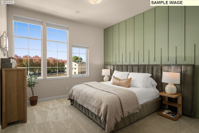 3522 SE Brookwood Ave, Hillsboro, OR 97123 - bedroom featuring light colored carpet and baseboards