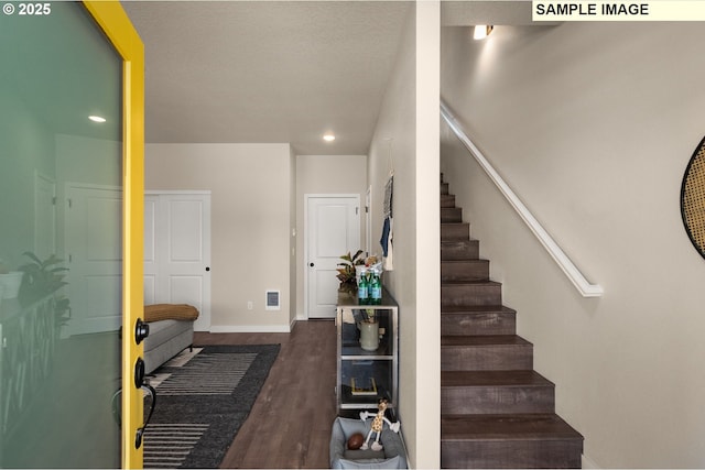 3522 SE Brookwood Ave, Hillsboro, OR 97123 - staircase featuring wood finished floors, recessed lighting, and baseboards