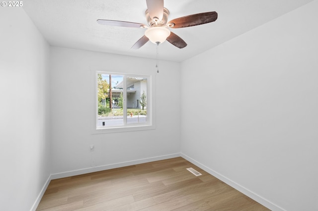 3235 SE 69th Ave, Portland, OR 97206 - unfurnished room featuring light wood-type flooring and a ceiling fan