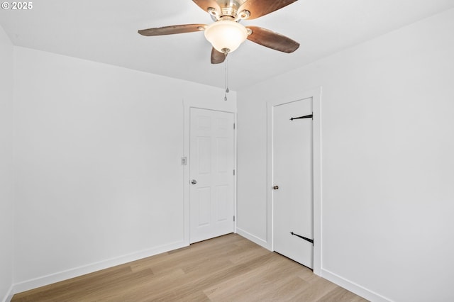 3235 SE 69th Ave, Portland, OR 97206 - empty room with light wood-style floors and ceiling fan