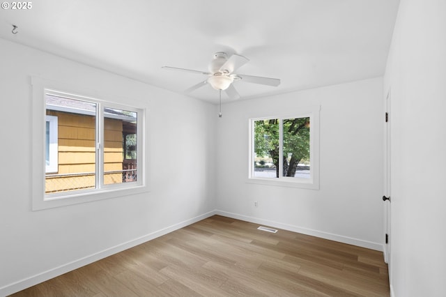 3235 SE 69th Ave, Portland, OR 97206 - unfurnished room with light wood-style flooring and a ceiling fan
