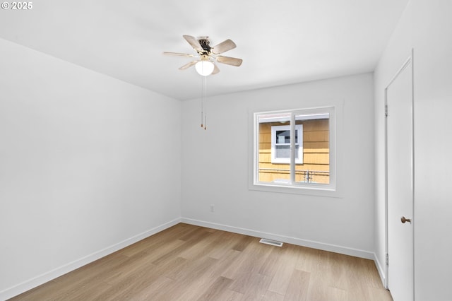 3235 SE 69th Ave, Portland, OR 97206 - unfurnished room with light wood-style floors and a ceiling fan