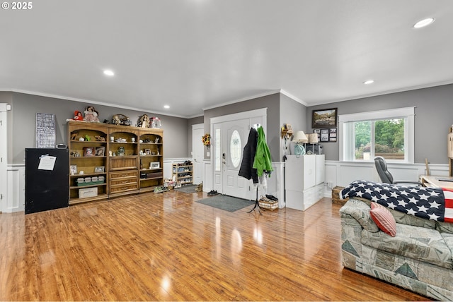 190 Walnut St, Myrtle Creek, OR 97457 - foyer entrance with crown molding, wood finished floors, recessed lighting, a wainscoted wall, and a decorative wall