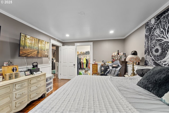 190 Walnut St, Myrtle Creek, OR 97457 - bedroom with crown molding, a spacious closet, a closet, recessed lighting, and a wainscoted wall