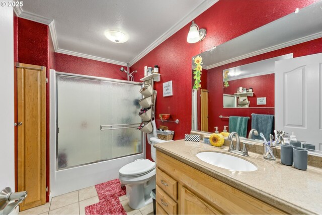 190 Walnut St, Myrtle Creek, OR 97457 - full bath featuring tile patterned floors, ornamental molding, shower / bath combination with glass door, toilet, and vanity