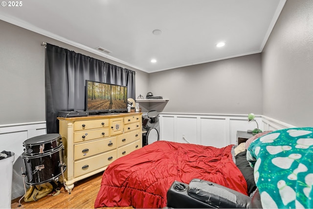 190 Walnut St, Myrtle Creek, OR 97457 - bedroom featuring crown molding, light wood-type flooring, and a wainscoted wall