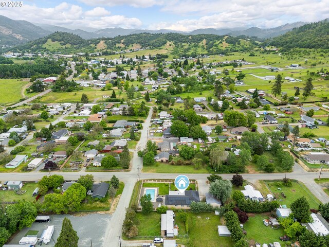 190 Walnut St, Myrtle Creek, OR 97457 - aerial overview of property's location with a mountainous background and nearby suburban area