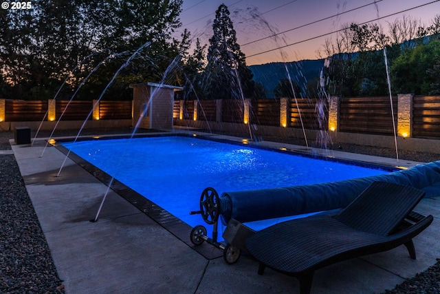 190 Walnut St, Myrtle Creek, OR 97457 - view of swimming pool featuring a fenced backyard and a mountain view