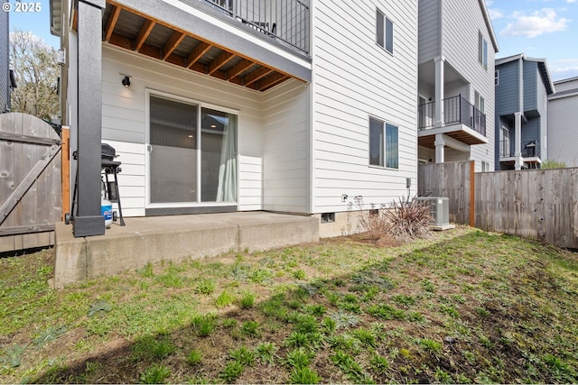 back of house with a patio, a gate, central AC, fence, and crawl space