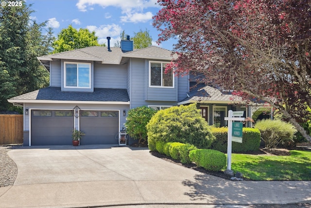 7826 SW Skyhar Dr, Portland, OR 97223 - traditional-style home featuring a garage, driveway, a chimney, and a shingled roof
