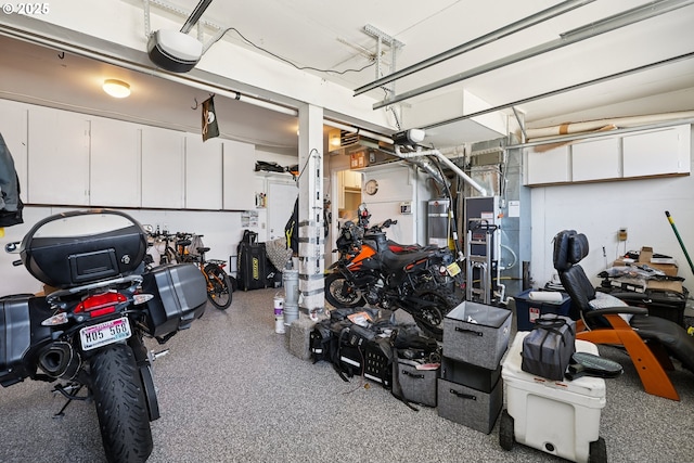 7826 SW Skyhar Dr, Portland, OR 97223 - garage featuring a garage door opener