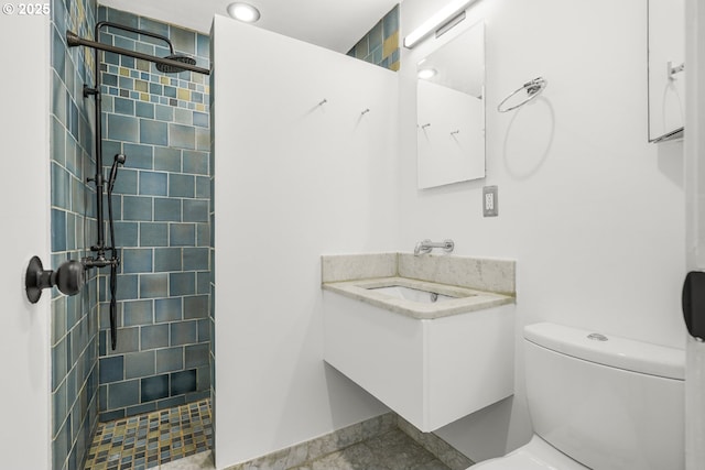 full bath featuring toilet, a walk in shower, and vanity