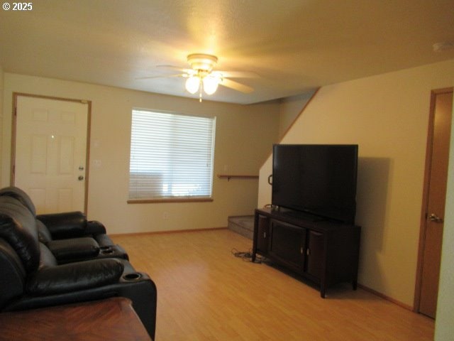 4792 Lancaster Dr Unit 100, Salem, OR 97305 - living area featuring a ceiling fan and light wood-type flooring