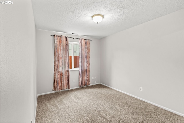 3191 Zinnia St, Eugene, OR 97404 - spare room featuring carpet flooring and a textured ceiling