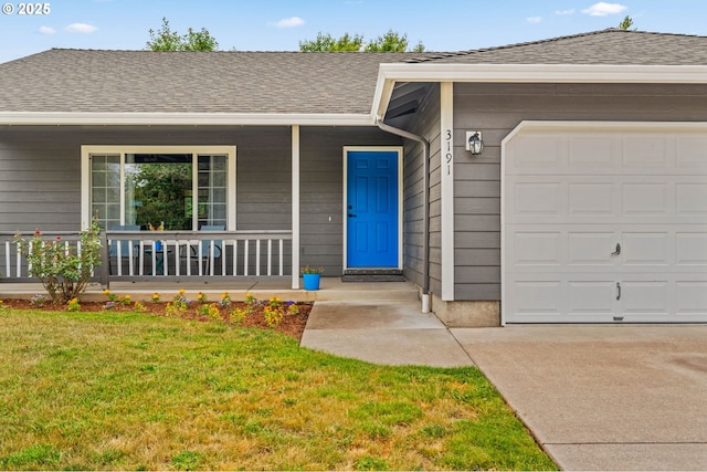3191 Zinnia St, Eugene, OR 97404 - view of front of house featuring covered porch, a garage, a front yard, concrete driveway, and a shingled roof