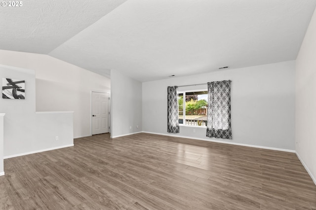 3191 Zinnia St, Eugene, OR 97404 - empty room featuring wood finished floors and lofted ceiling
