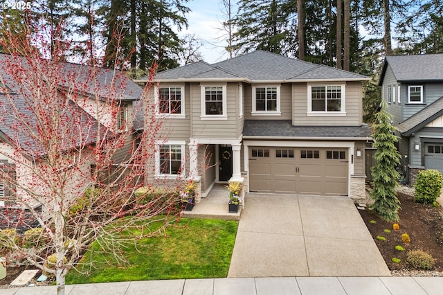 view of front of house featuring concrete driveway, a garage, and roof with shingles