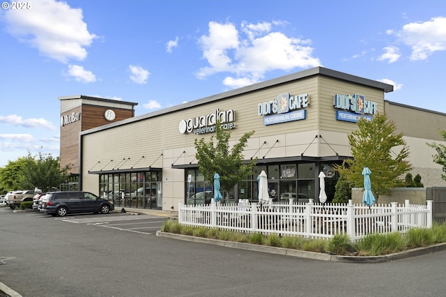 17011 SW Red Leaf Pl, Sherwood, OR 97140 - view of commercial property with fence and uncovered parking