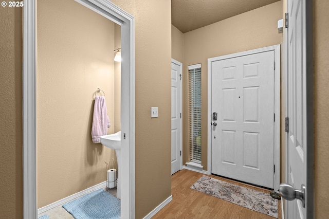 17011 SW Red Leaf Pl, Sherwood, OR 97140 - foyer featuring wood finished floors and baseboards