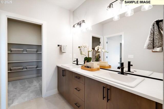 12100 SW Trask St, Beaverton, OR 97007 - bathroom featuring double vanity, tile patterned floors, and a sink
