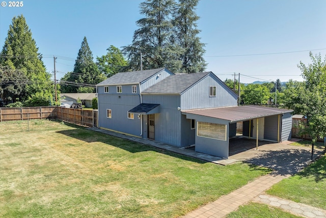 11500 SW Denney Rd, Beaverton, OR 97008 - rear view of property with a carport, a metal roof, and roof with shingles