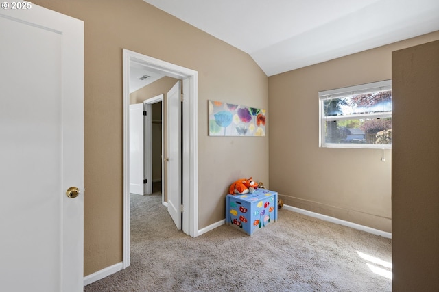 1013 NE Birchwood Dr, Hillsboro, OR 97124 - playroom with vaulted ceiling, baseboards, and carpet