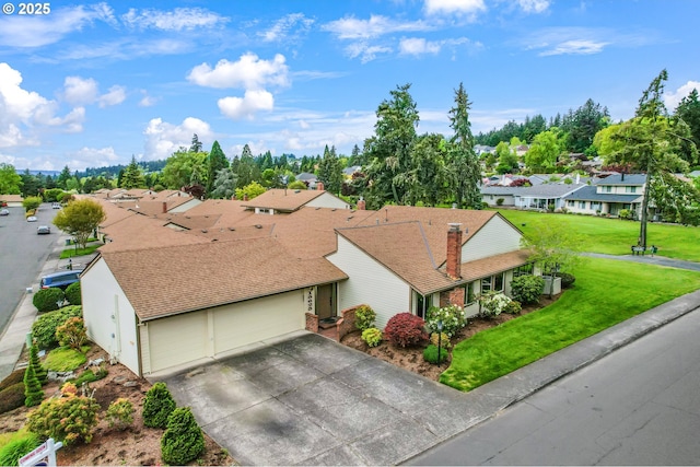 drone / aerial view with a residential view