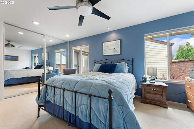 bedroom featuring recessed lighting, carpet, ceiling fan, and a closet