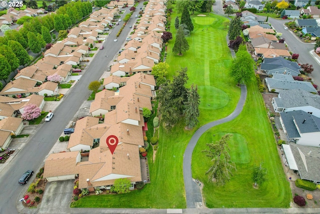 bird's eye view featuring view of golf course and a residential view