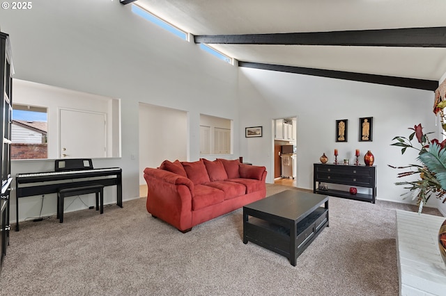 living area with carpet floors, baseboards, high vaulted ceiling, and beam ceiling