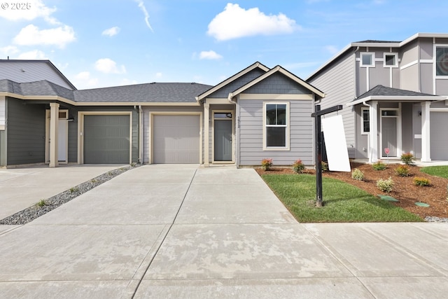1912 NW 18th Ave, Battle Ground, WA 98604 - view of front of home with driveway and an attached garage
