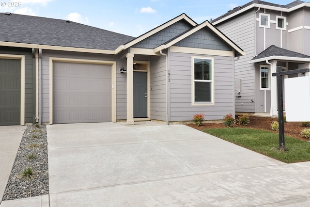 1912 NW 18th Ave, Battle Ground, WA 98604 - view of front of home with concrete driveway and an attached garage