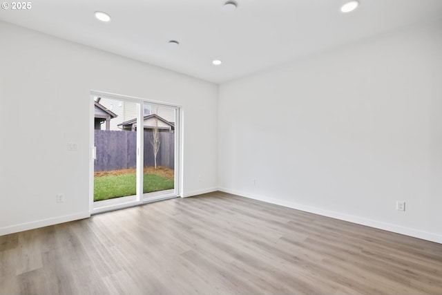 1912 NW 18th Ave, Battle Ground, WA 98604 - spare room with recessed lighting, baseboards, and wood finished floors
