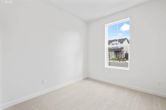 1912 NW 18th Ave, Battle Ground, WA 98604 - unfurnished room with baseboards and light colored carpet