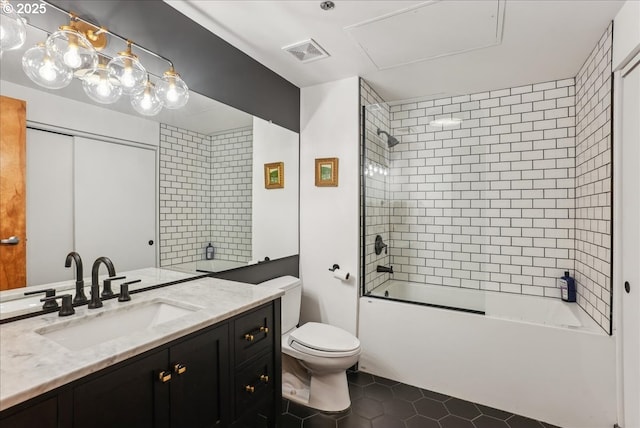 full bath with visible vents, toilet, tile patterned flooring, vanity, and shower / washtub combination