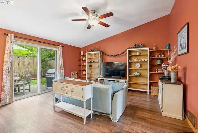 108 Watts Ave, Cascade Locks, OR 97014 - living area with vaulted ceiling, wood finished floors, and a ceiling fan