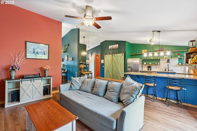 108 Watts Ave, Cascade Locks, OR 97014 - living area with lofted ceiling, ceiling fan, and light wood finished floors
