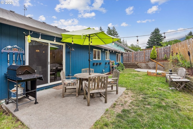108 Watts Ave, Cascade Locks, OR 97014 - fenced backyard featuring a patio area and outdoor dining space