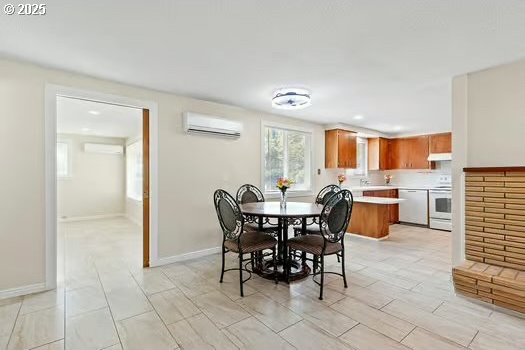 2065 Providence St, Eugene, OR 97401 - dining space featuring a wall mounted AC, an AC wall unit, and recessed lighting