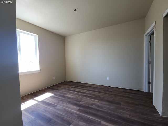 600 4th St, Gervais, OR 97026 - unfurnished room featuring dark wood finished floors and baseboards