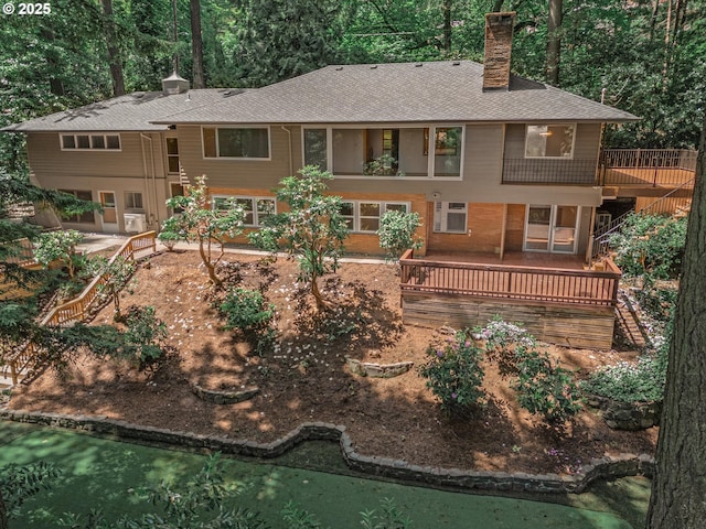 10818 S Summerville Ave, Portland, OR 97219 - back of house with a chimney, a shingled roof, a wooden deck, and a balcony