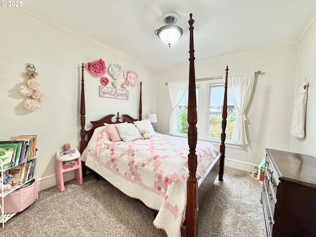 carpeted bedroom featuring baseboards and ornamental molding